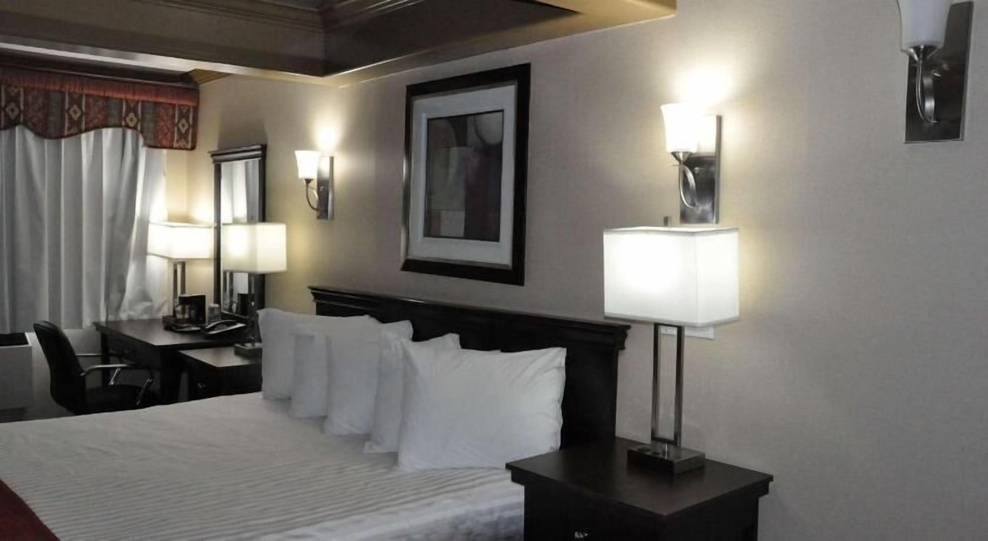 Premium bedding, pillowtop beds, desk, blackout drapes