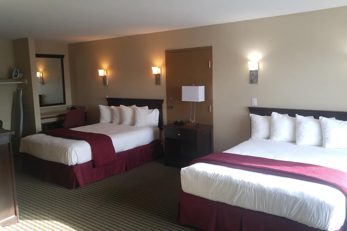 premium bedding, pillow-top beds, desk, blackout curtains