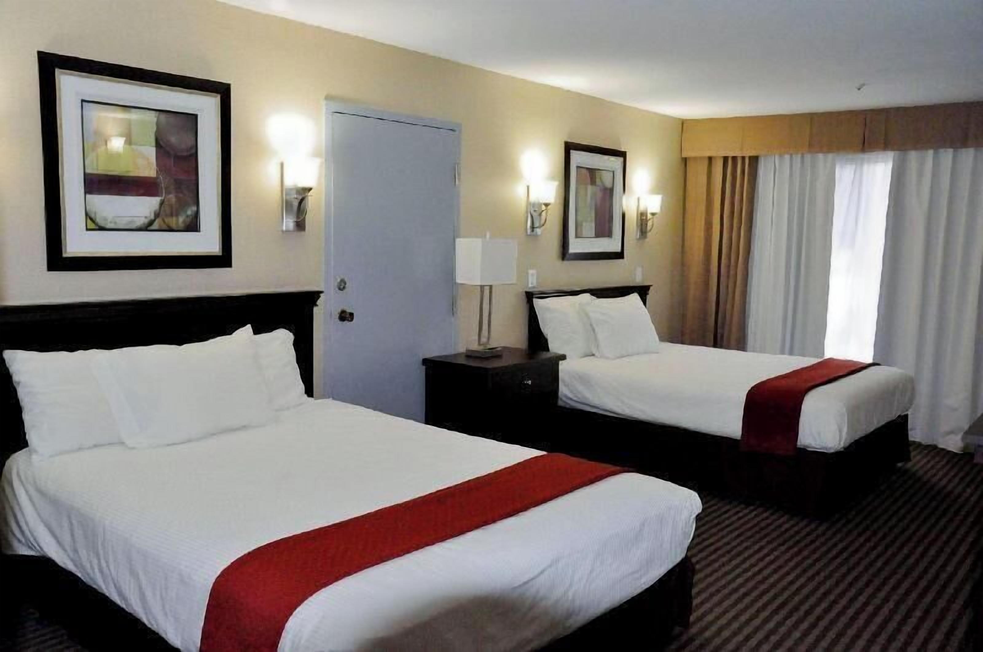 Premium bedding, pillowtop beds, desk, blackout drapes