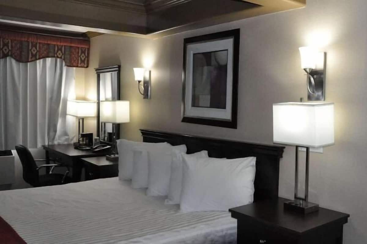 Premium bedding, pillowtop beds, desk, blackout drapes
