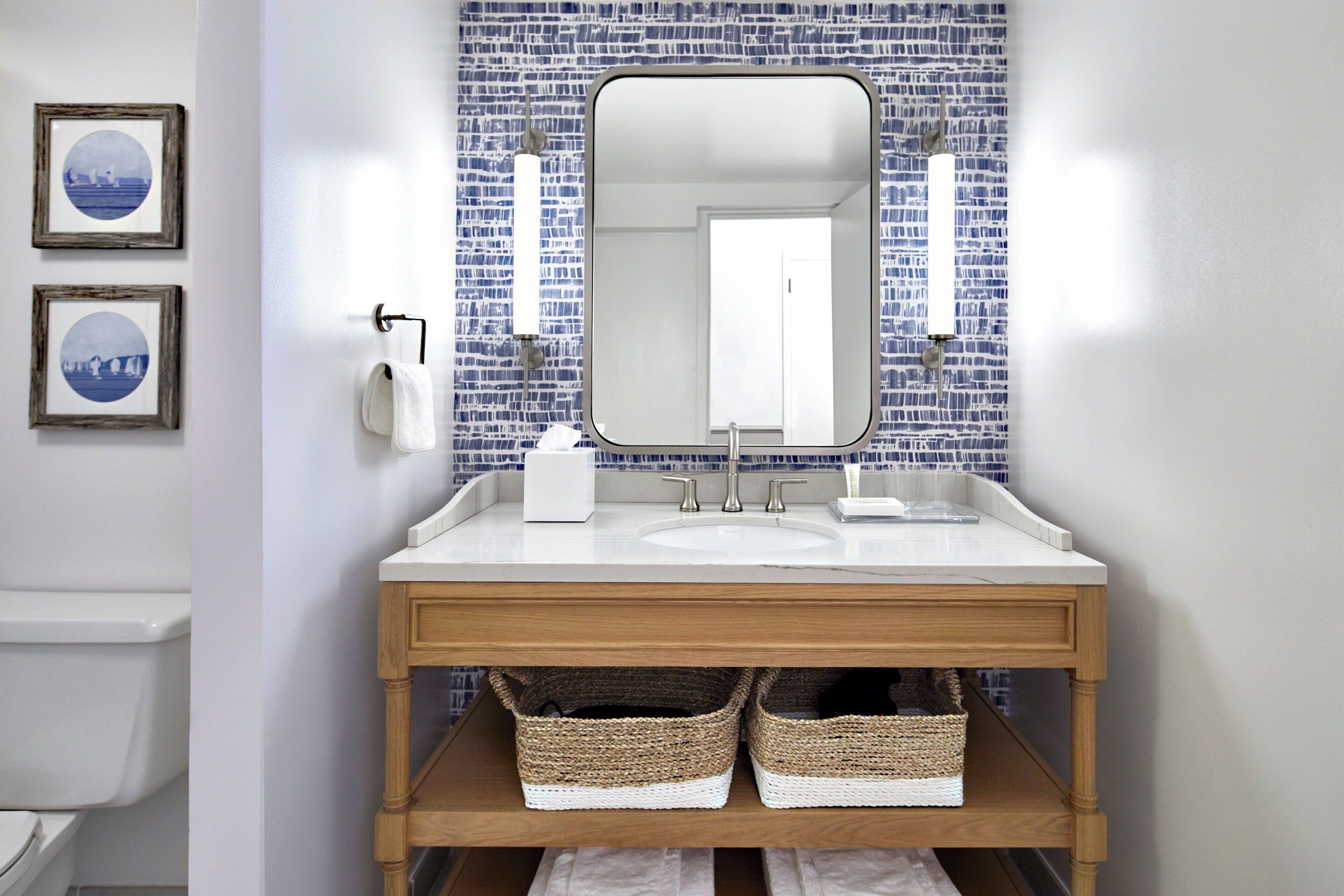 designer toiletries, hair dryer, bathrobes, slippers