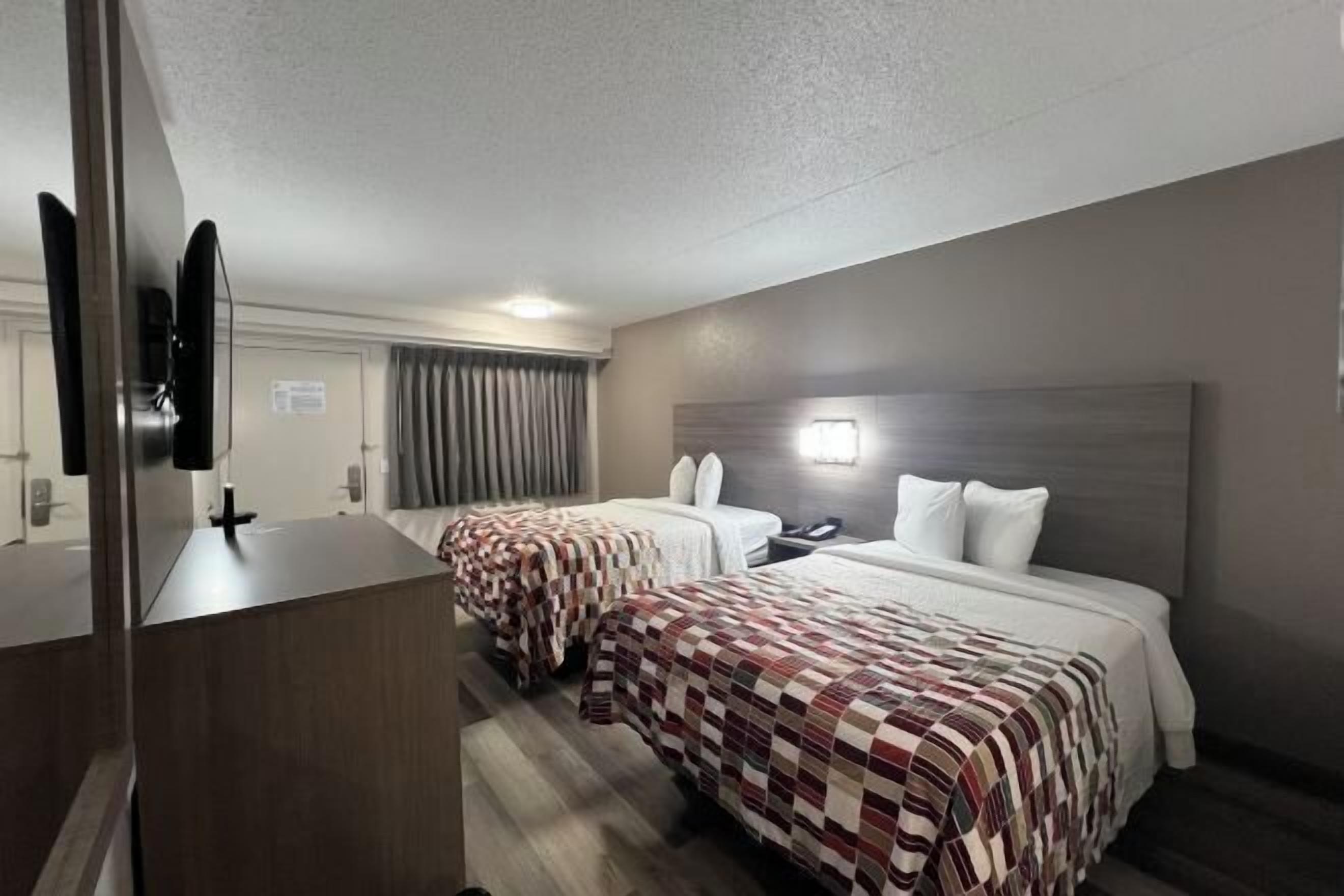 Desk, blackout drapes, free cribs/infant beds, free WiFi