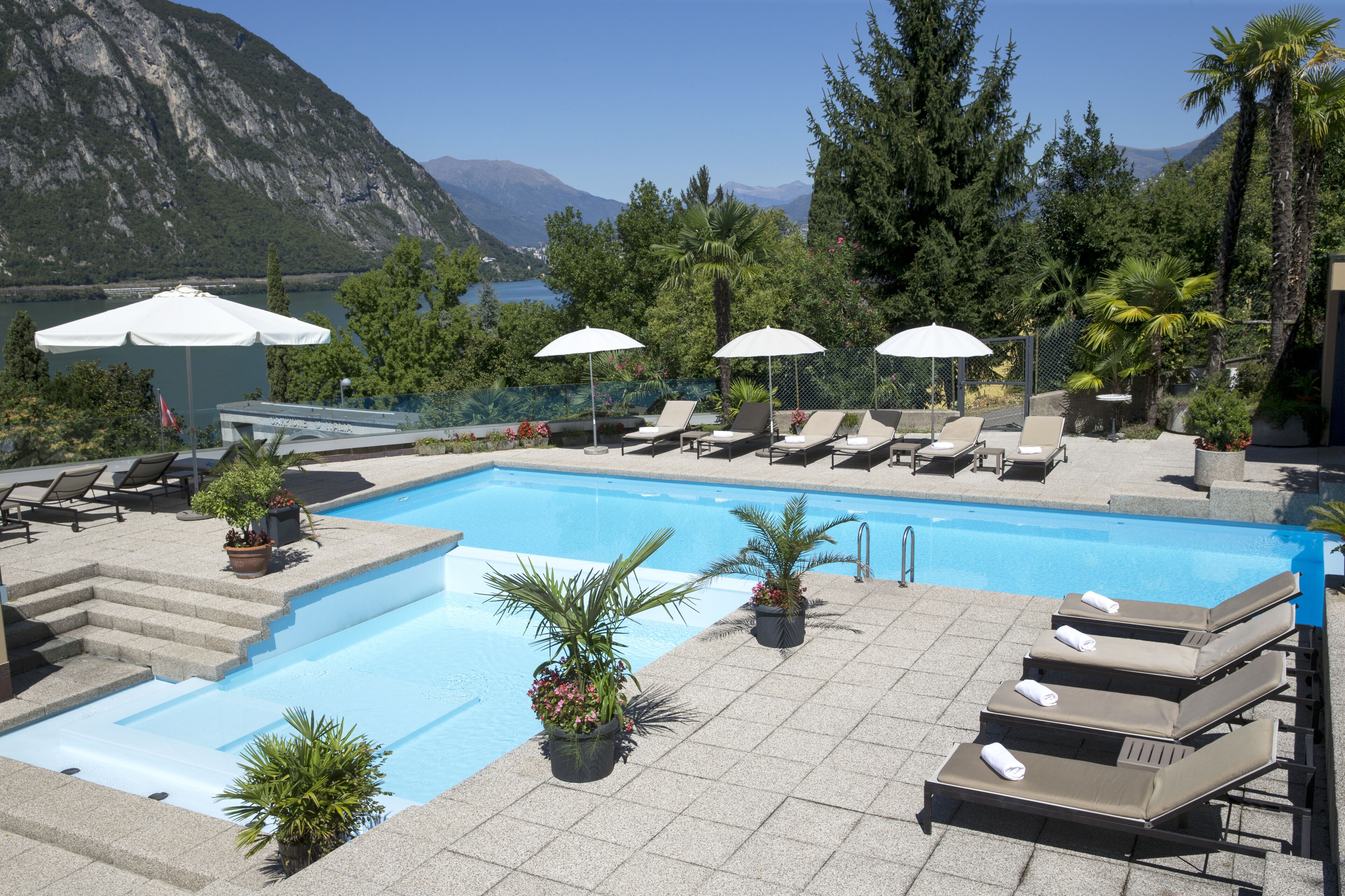 Seasonal outdoor pool, pool umbrellas, sun loungers