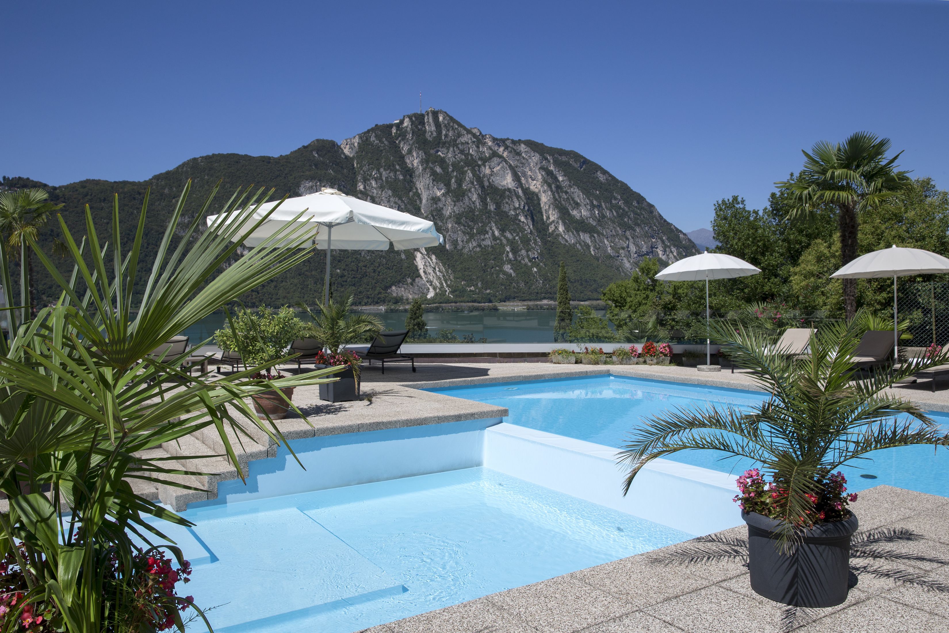 seasonal outdoor pool, pool umbrellas, pool loungers