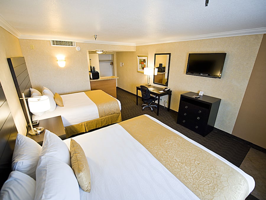 Desk, laptop workspace, blackout drapes, iron/ironing board