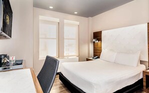 Egyptian cotton sheets, premium bedding, down comforters, pillowtop beds - The Gallivant Times Square (New York)