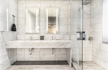Junior Penthouse, Multiple Beds, Balcony (Junior Penthouse 2) | Bathroom | Shower, rainfall showerhead, eco-friendly toiletries, hair dryer at The Gallivant Times Square
