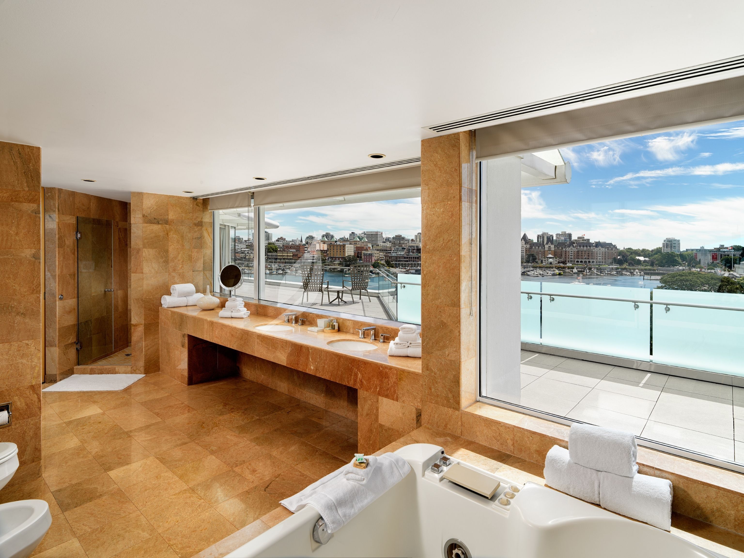 designer toiletries, hair dryer, bathrobes, towels