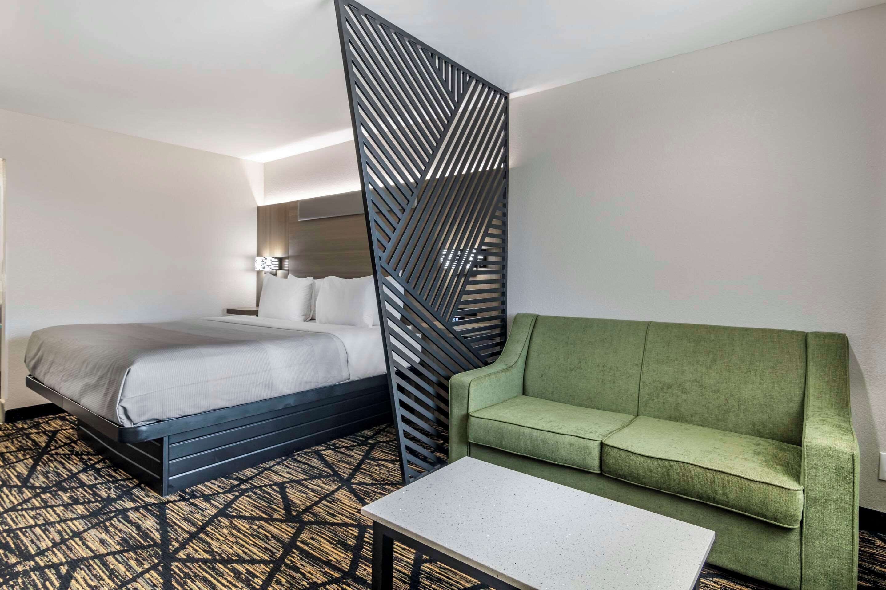 suite, 1 king bed with sofa bed, non smoking | desk, iron/ironing board, free cots/infant beds, free wifi