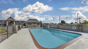 Outdoor pool, open 10:00 AM to 10 PM, free cabanas, pool umbrellas