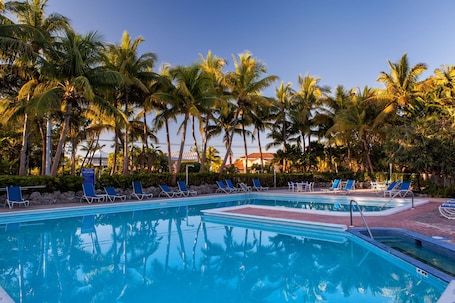 Outdoor pool, sun loungers. Marina Del Mar Resort and Marina