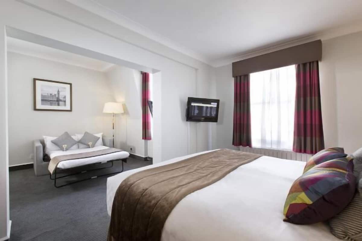 In-room safe, desk, laptop workspace, iron/ironing board
