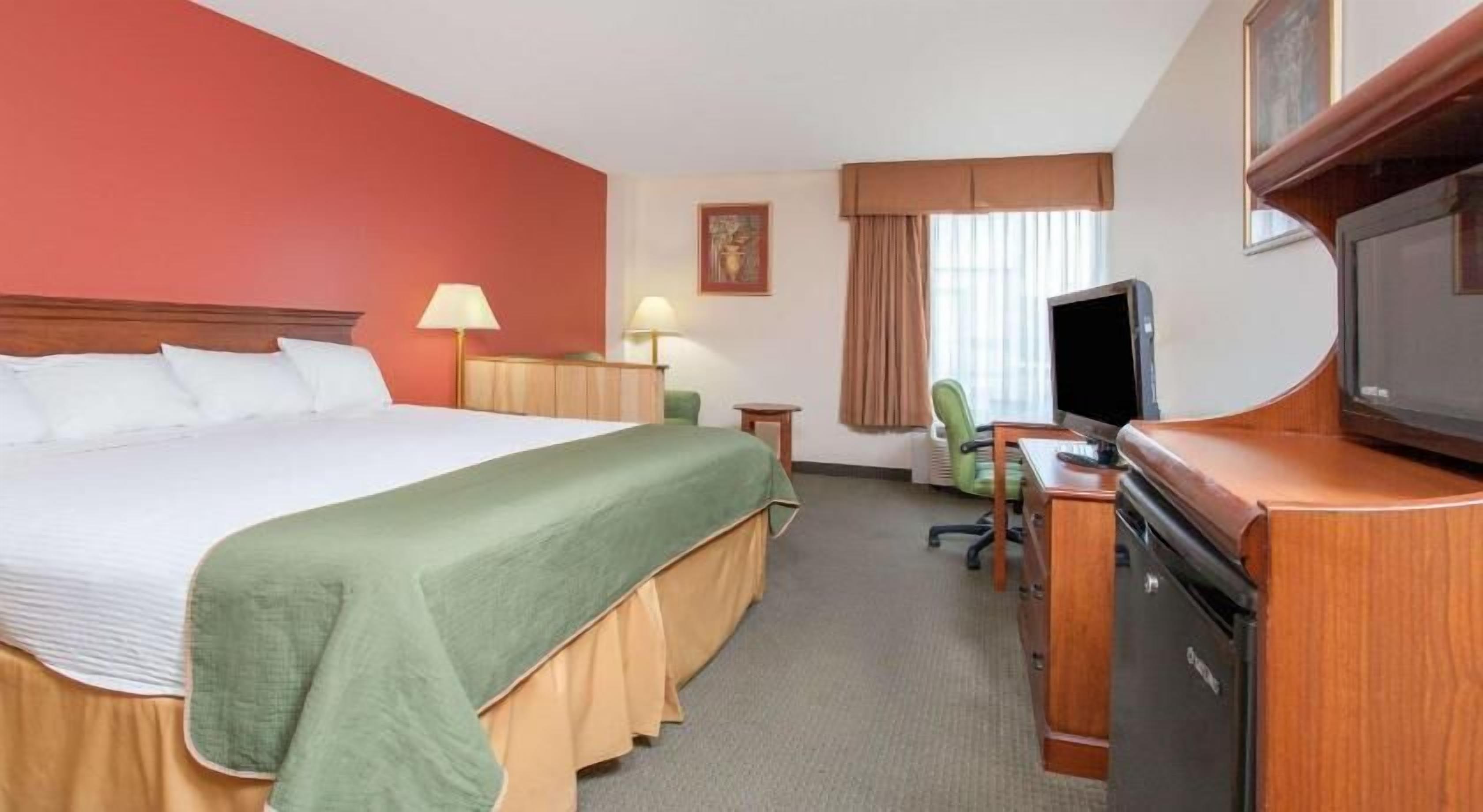 Desk, blackout curtains, iron/ironing board, free cots/infant beds