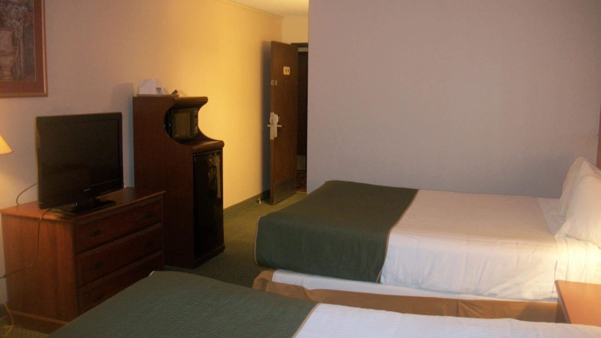 Desk, blackout curtains, iron/ironing board, free cots/infant beds