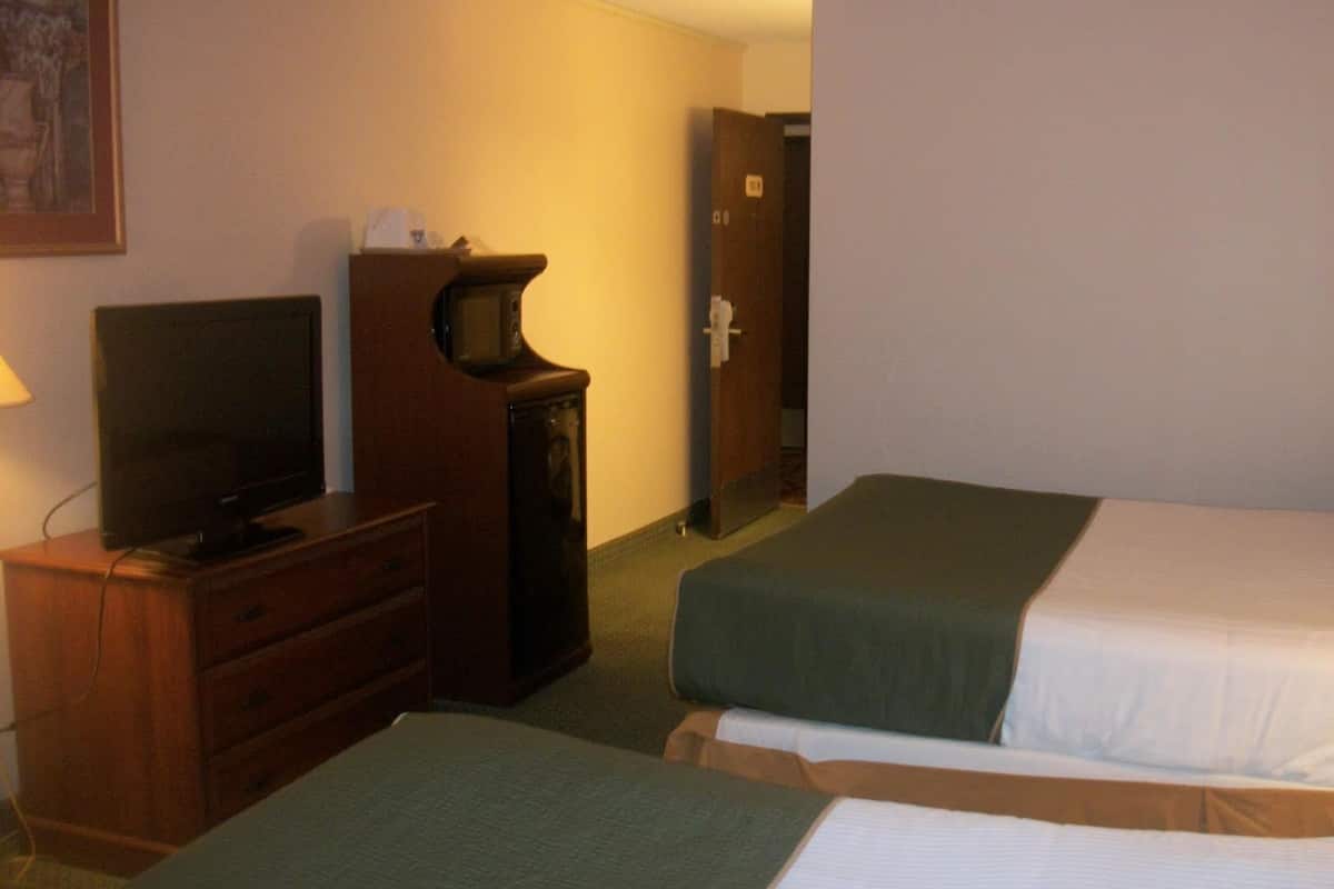 Desk, blackout curtains, iron/ironing board, free cots/infant beds