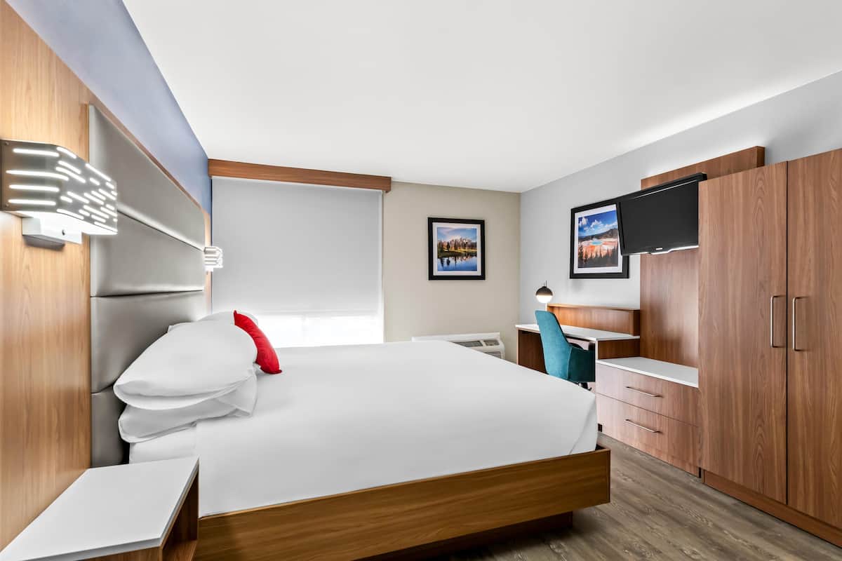 Deluxe Suite, 1 King Bed (Two Rooms) | 1 bedroom, premium bedding, desk, laptop workspace