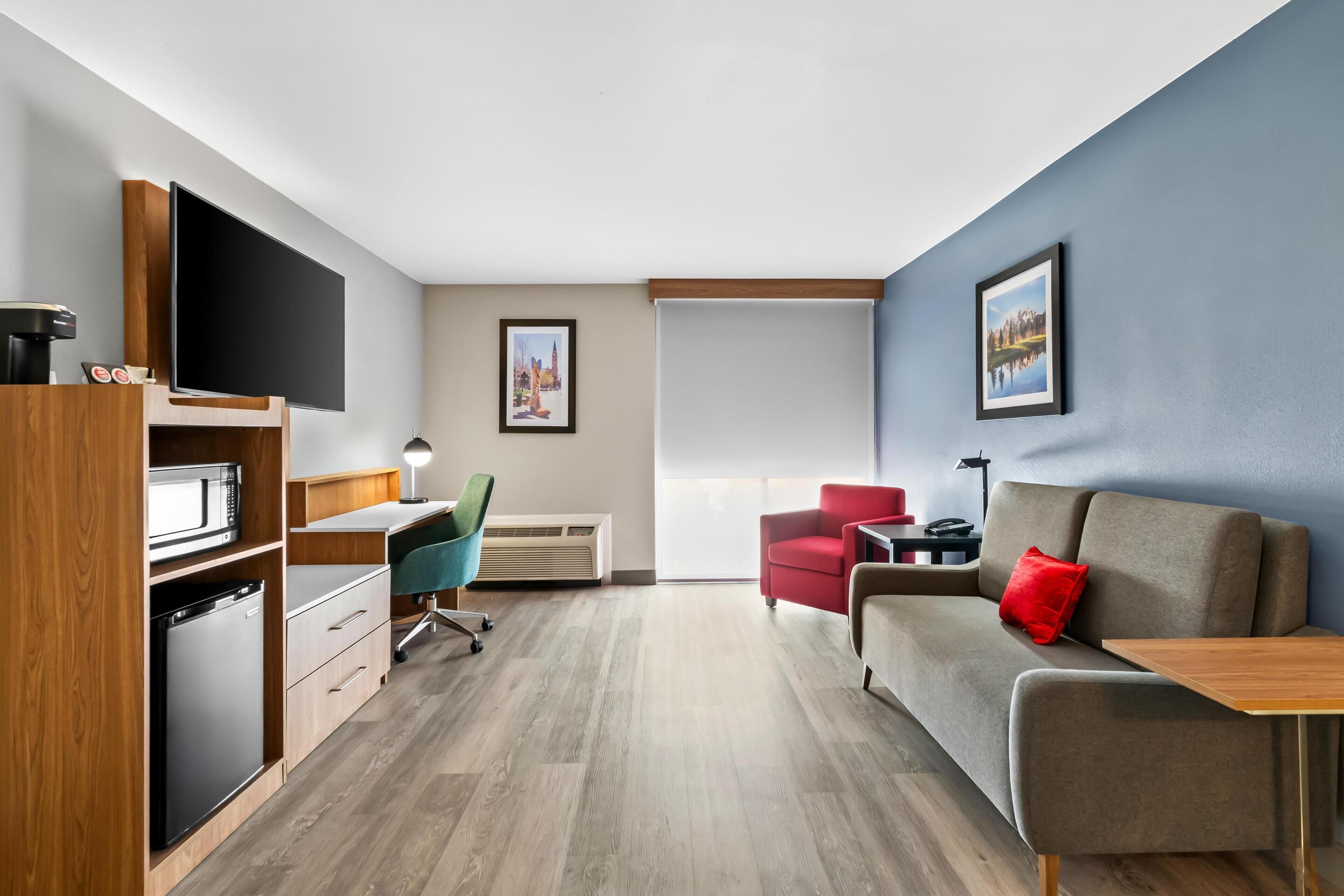 Deluxe Suite, 1 King Bed (Two Rooms) | Premium bedding, desk, laptop workspace, blackout drapes