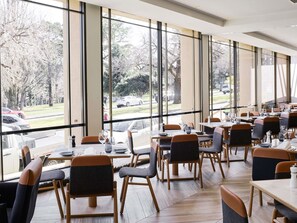 Breakfast, dinner served; local cuisine, garden views