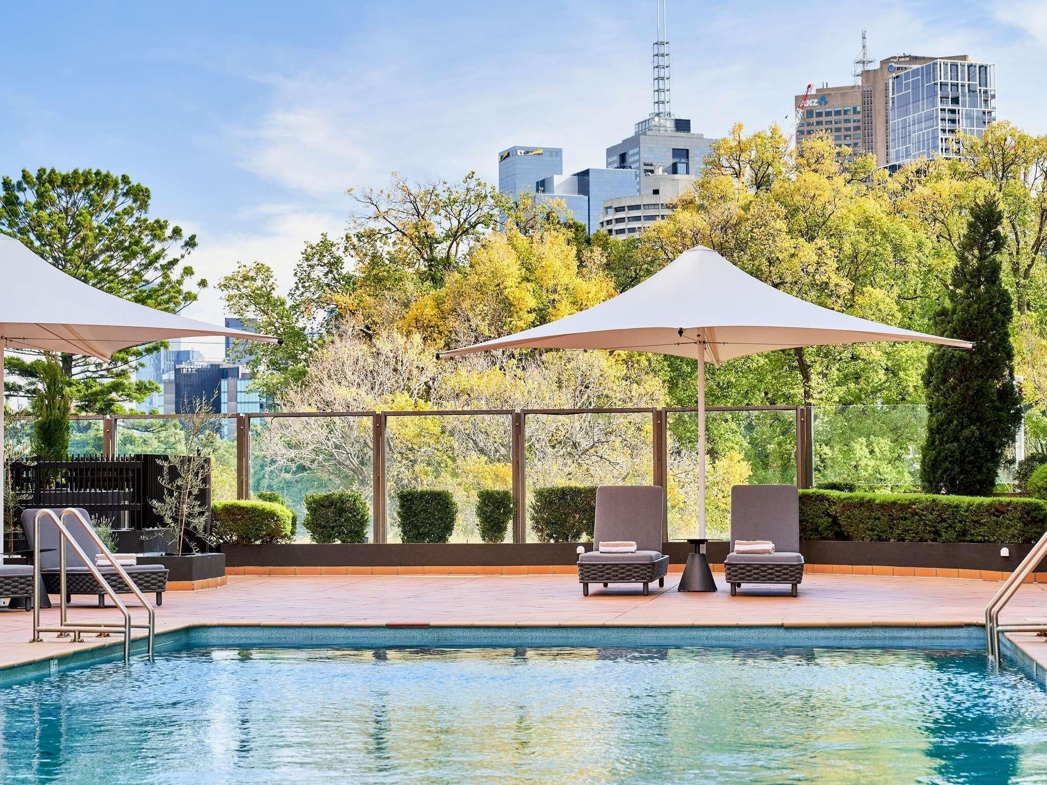 Outdoor pool, pool umbrellas, pool loungers