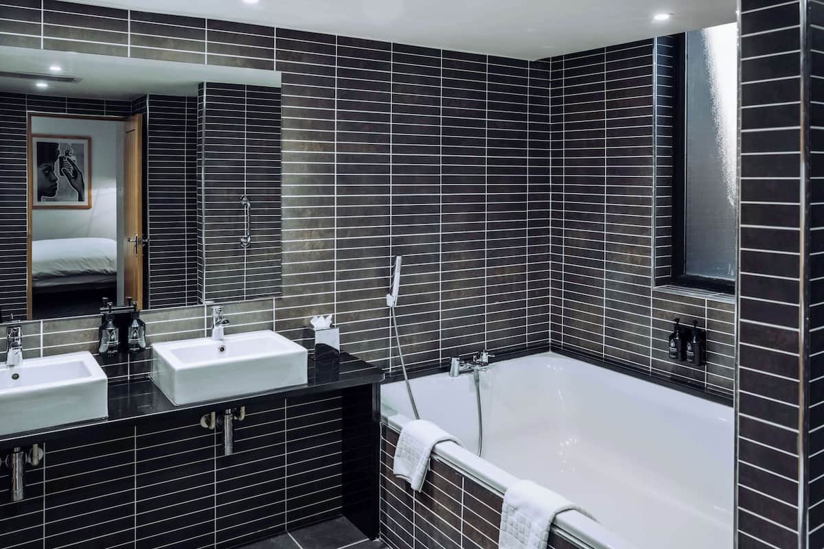 penta junior suite | bathroom | shower, rainfall showerhead, designer toiletries, hair dryer