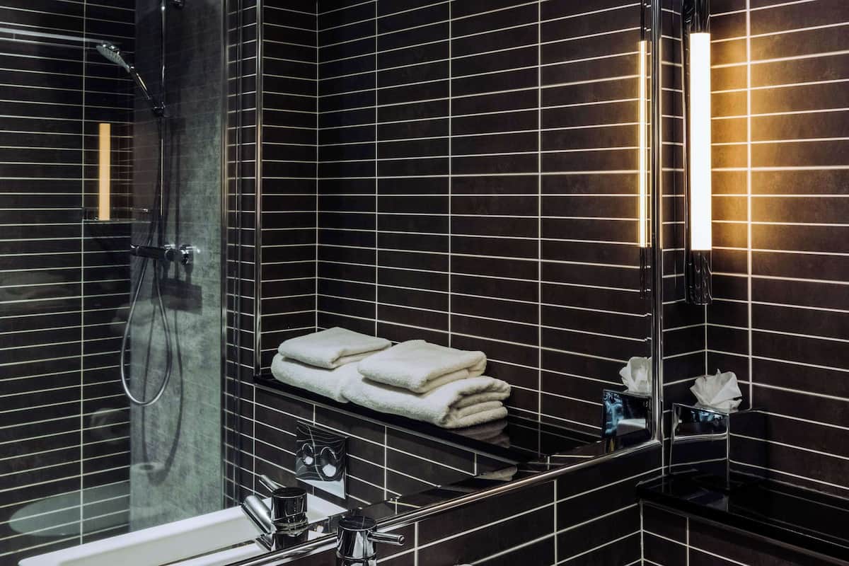 shower, rainfall showerhead, designer toiletries, hair dryer