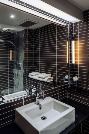 Shower, rainfall showerhead, designer toiletries, hair dryer