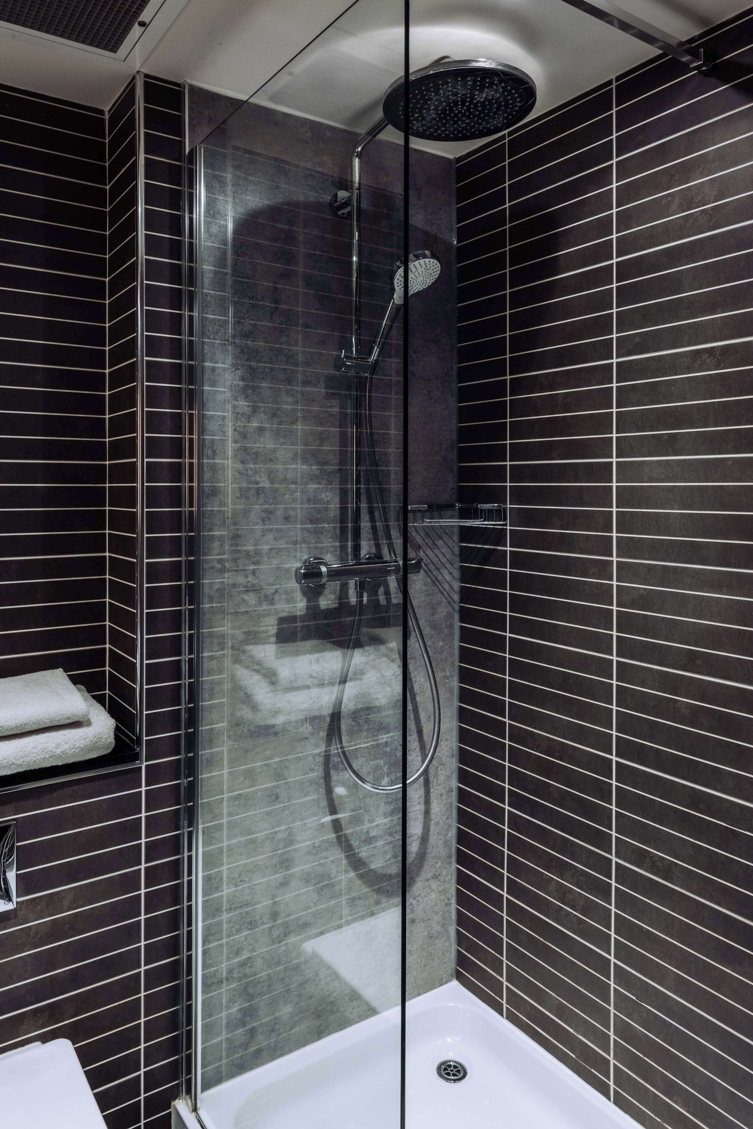 hypo-allergenic bedding, desk, laptop workspace, blackout curtains