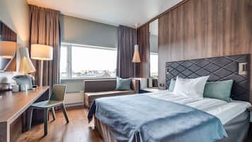 Pillow-top beds, desk, blackout curtains, cots/infant beds