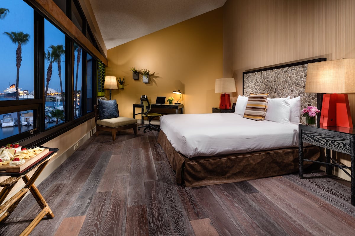 Room, 1 King Bed (Water View) | Pillow-top beds, in-room safe, desk, blackout curtains