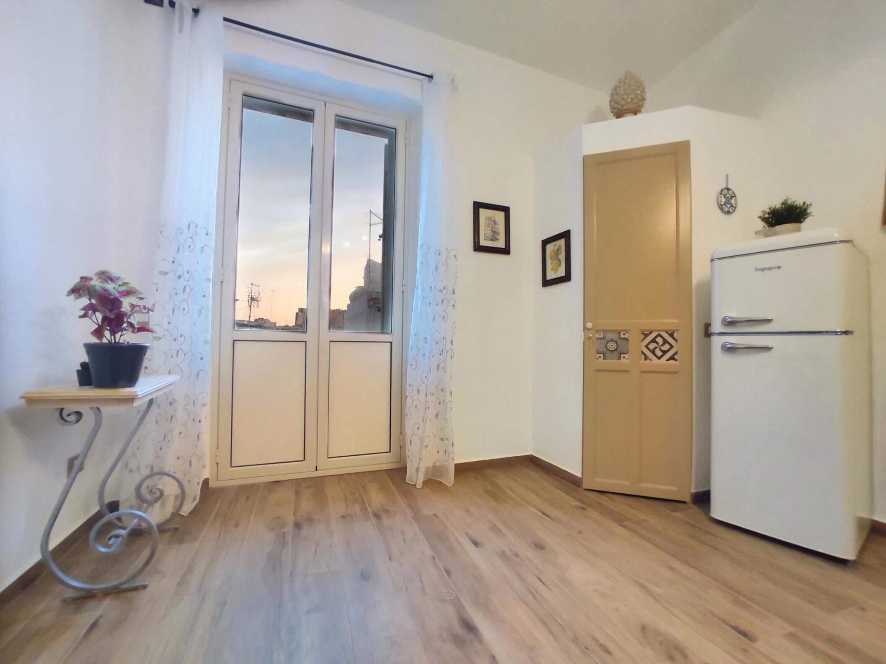 Fridge, coffee/tea maker, electric kettle, toaster