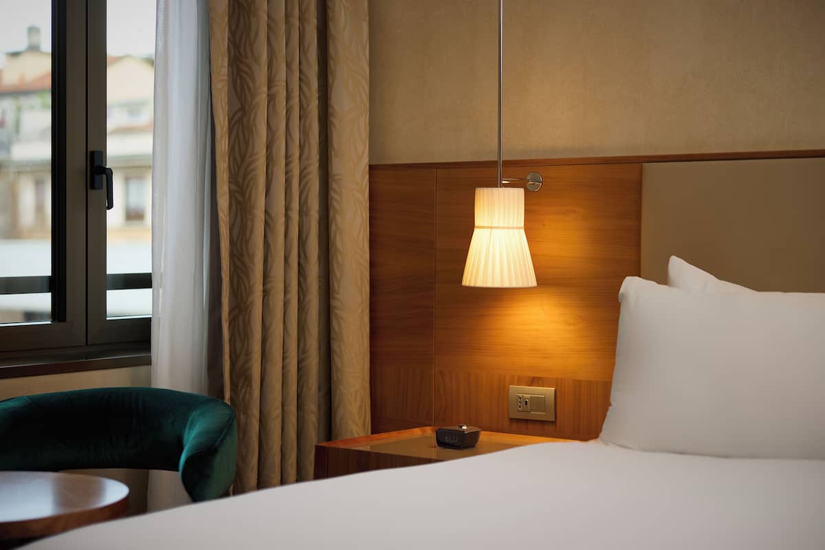 Hypo-allergenic bedding, down comforters, minibar, in-room safe