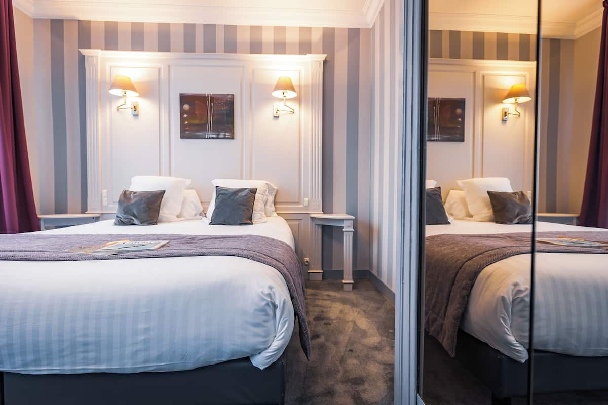 Literie hypoallergénique, coffres-forts dans les chambres, bureau