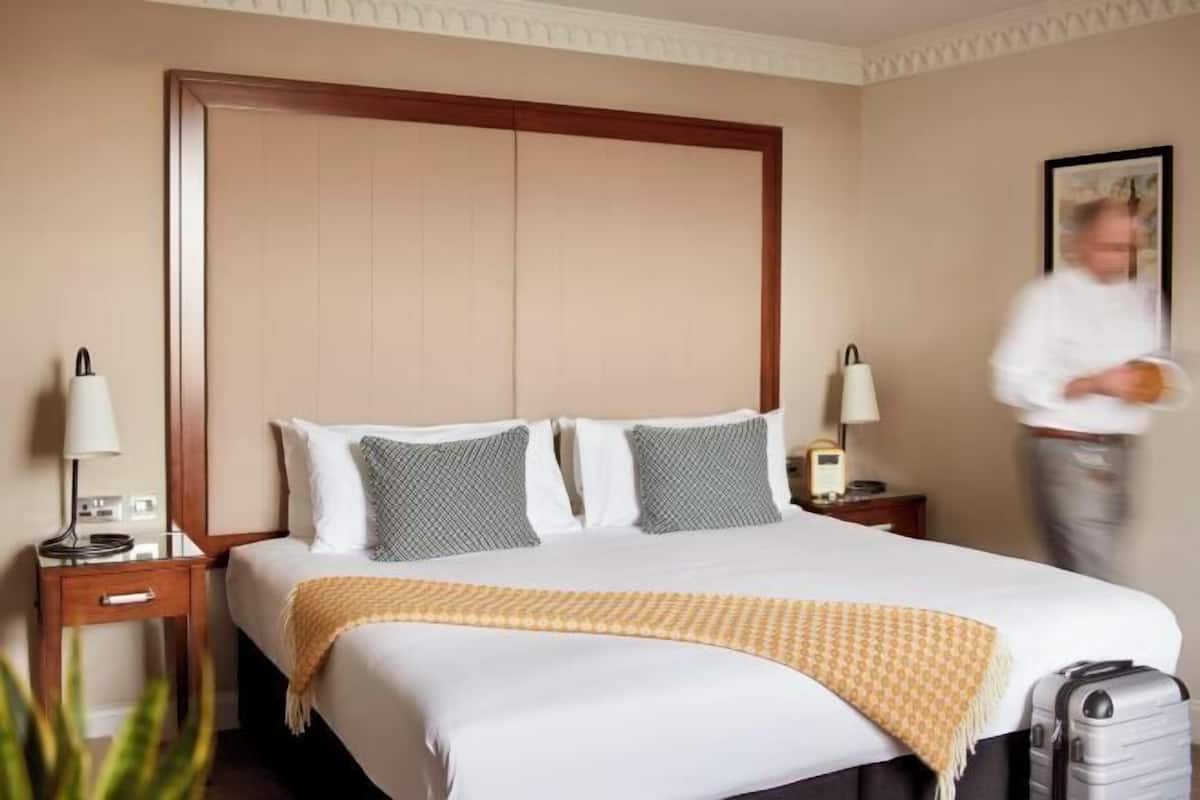 Down comforters, memory foam beds, in-room safe, desk