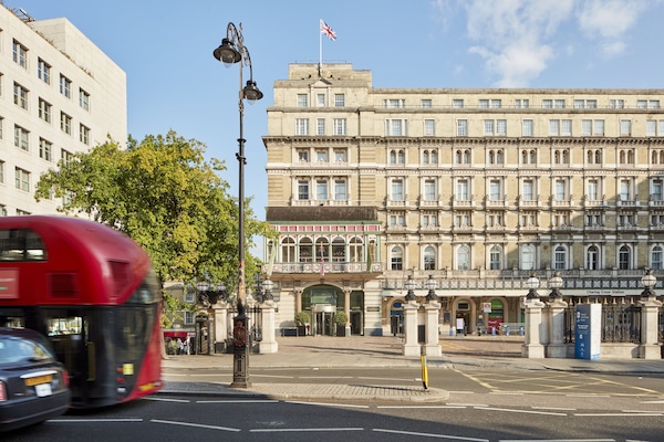 Stunning historic building with a classic facade, evenly spaced windows, and decorative elements, situated in the heart of the city.