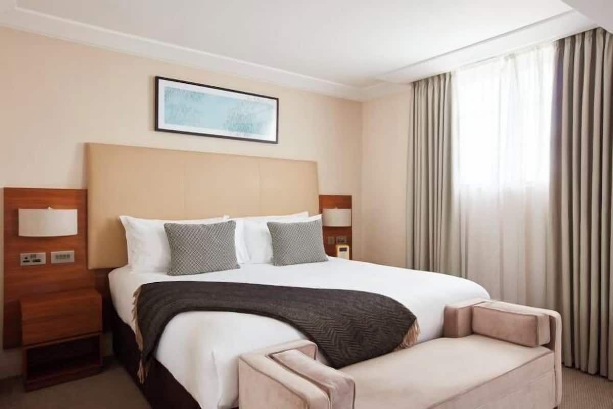 Down comforters, memory foam beds, in-room safe, desk