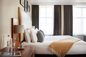 Down comforters, memory foam beds, in-room safe, desk