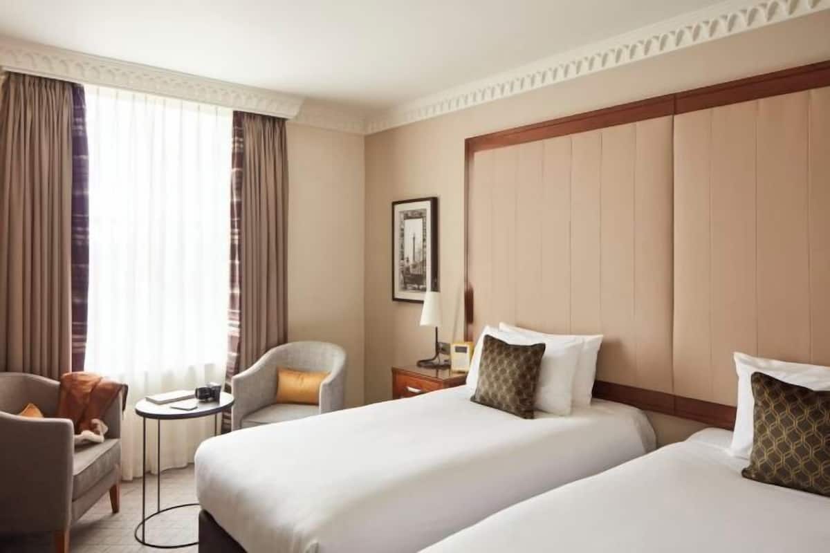 Down comforters, memory foam beds, in-room safe, desk