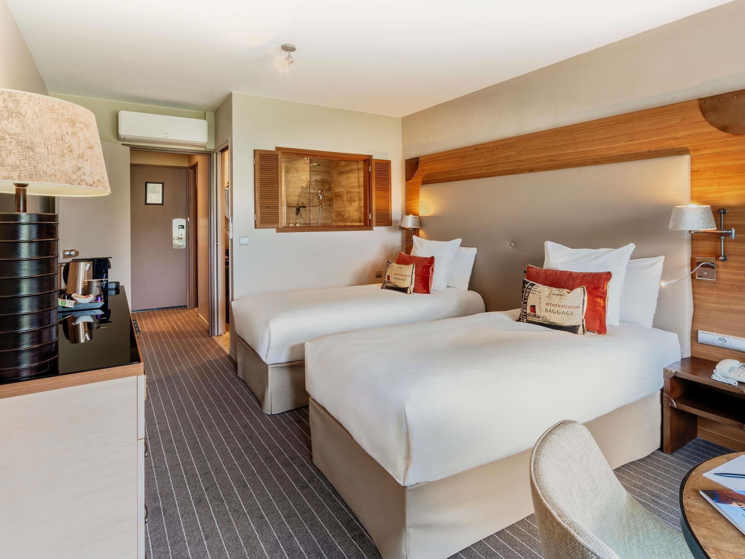 Literie de qualité supérieure, minibar, coffres-forts dans les chambres