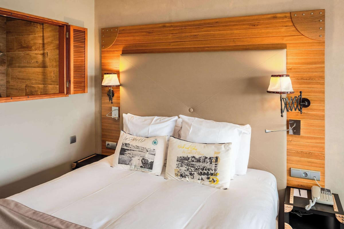 Ropa de cama de alta calidad y minibar