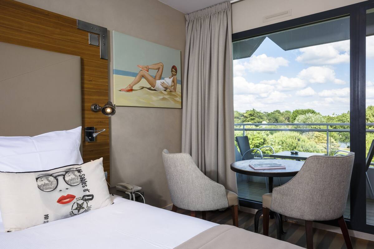 classic room, 1 double bed with sofa bed (overlooking pine forest) | view from room