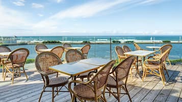 Lunch, dinner served; French cuisine, pool views