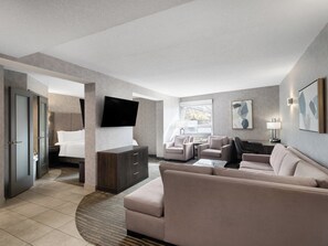 Suite, 1 King Bed, Jetted Tub | Pillowtop beds, desk, blackout drapes, iron/ironing board