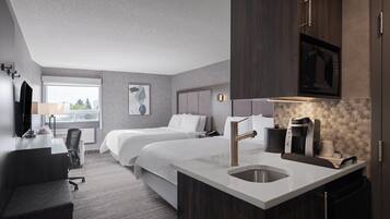 Pillowtop beds, desk, blackout drapes, iron/ironing board