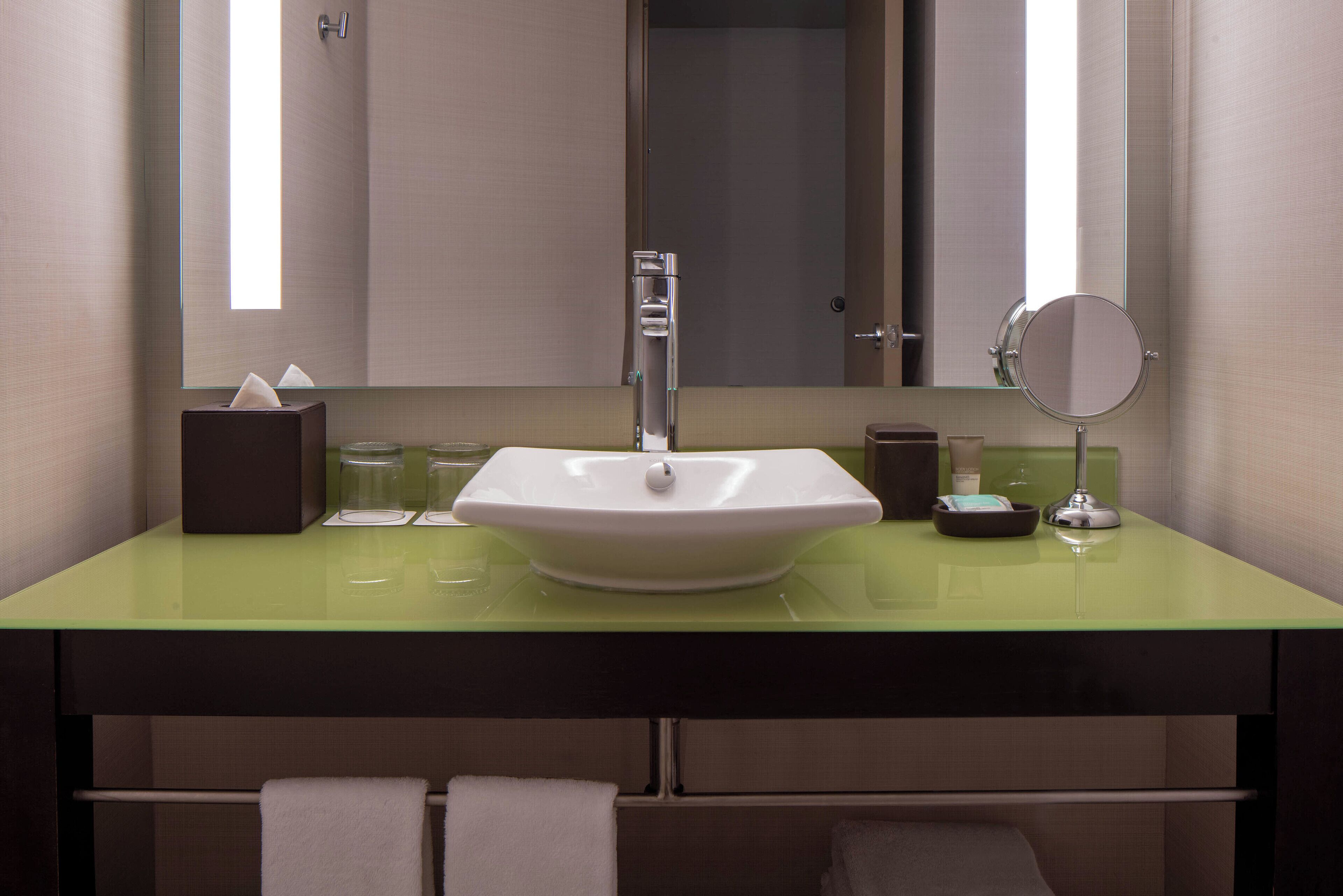 designer toiletries, hair dryer, bathrobes, towels