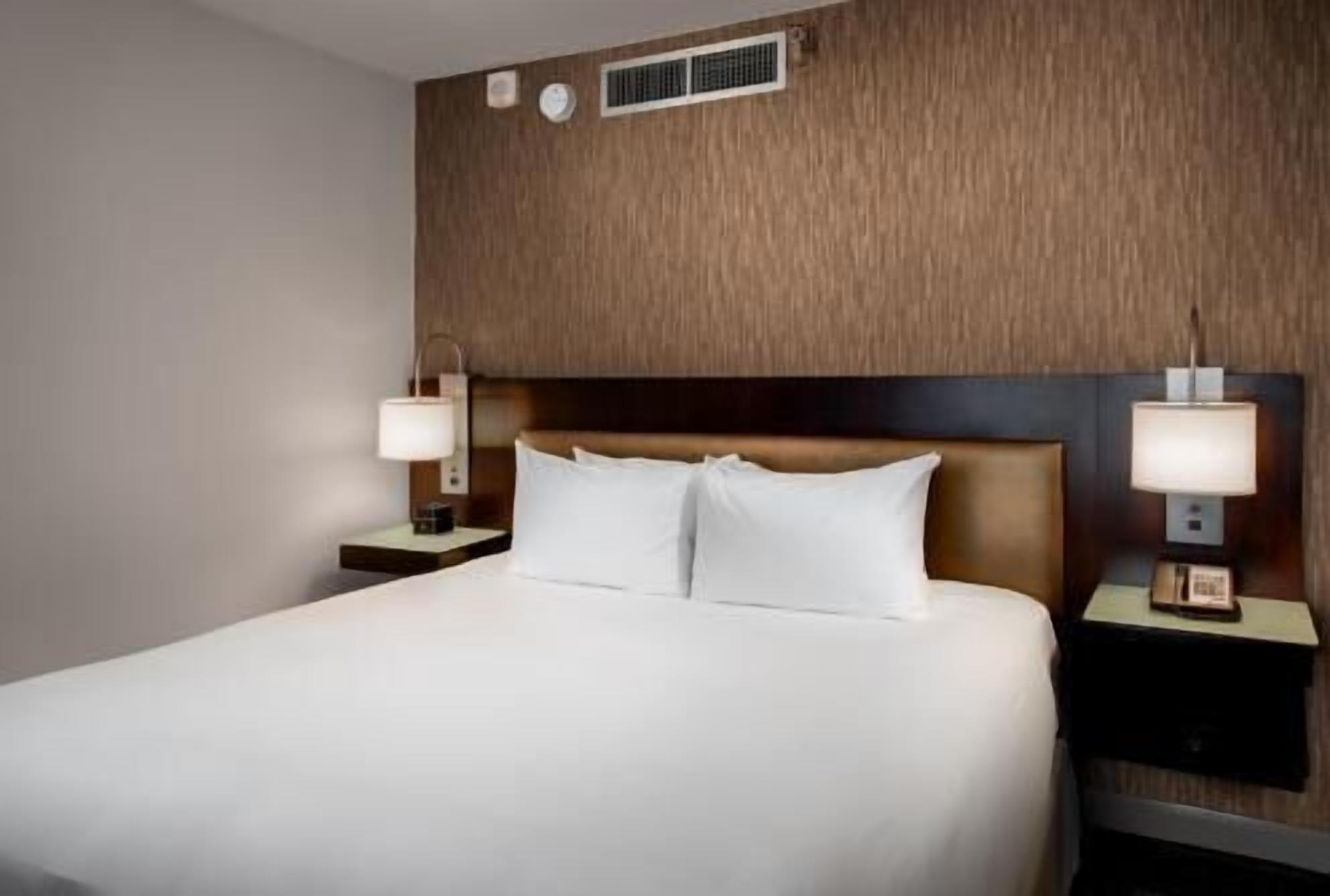 Premium bedding, down comforters, in-room safe, desk