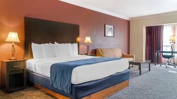 Suite, 1 King Bed, Non Smoking, Jetted Tub | In-room safe, desk, laptop workspace, blackout drapes