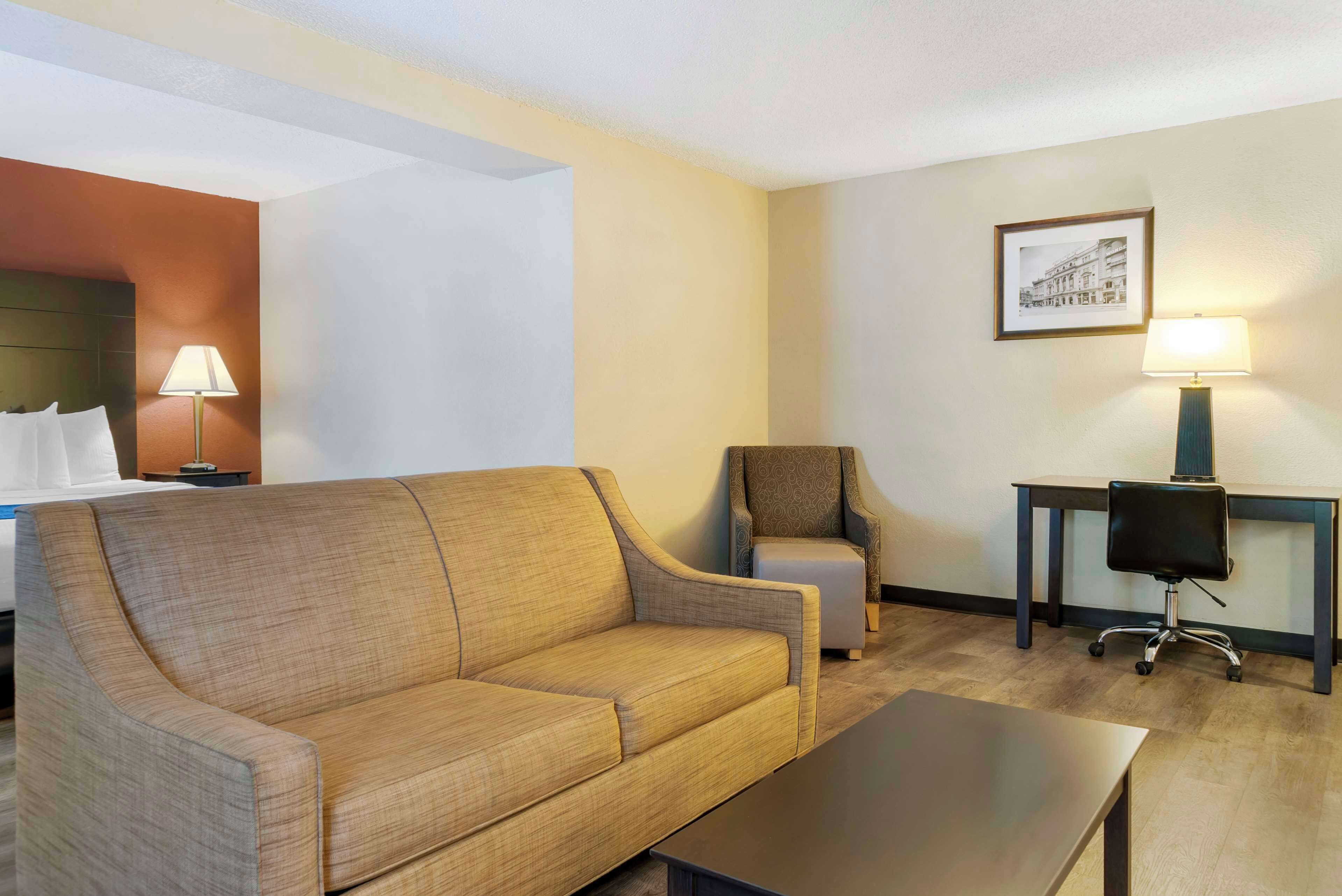 suite, 1 king bed, non smoking, refrigerator & microwave | in-room safe, desk, laptop workspace, blackout curtains