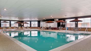 Indoor pool, pool umbrellas, sun loungers