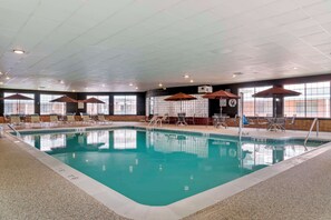 Indoor pool, pool umbrellas, sun loungers