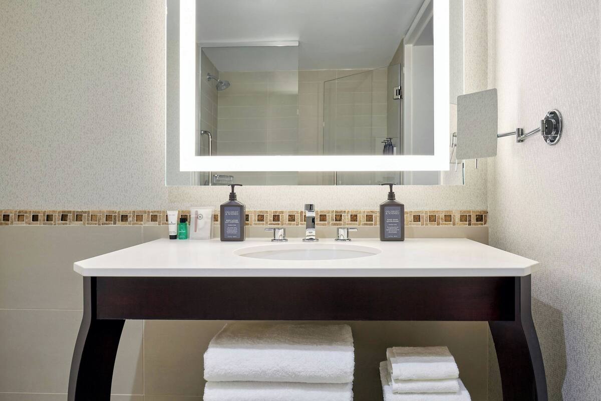 shower, eco-friendly toiletries, hair dryer, towels